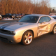 Illustration for article titled For Sale: One “Slightly Damaged” Challenger SRT8 With 29 Miles On Odometer